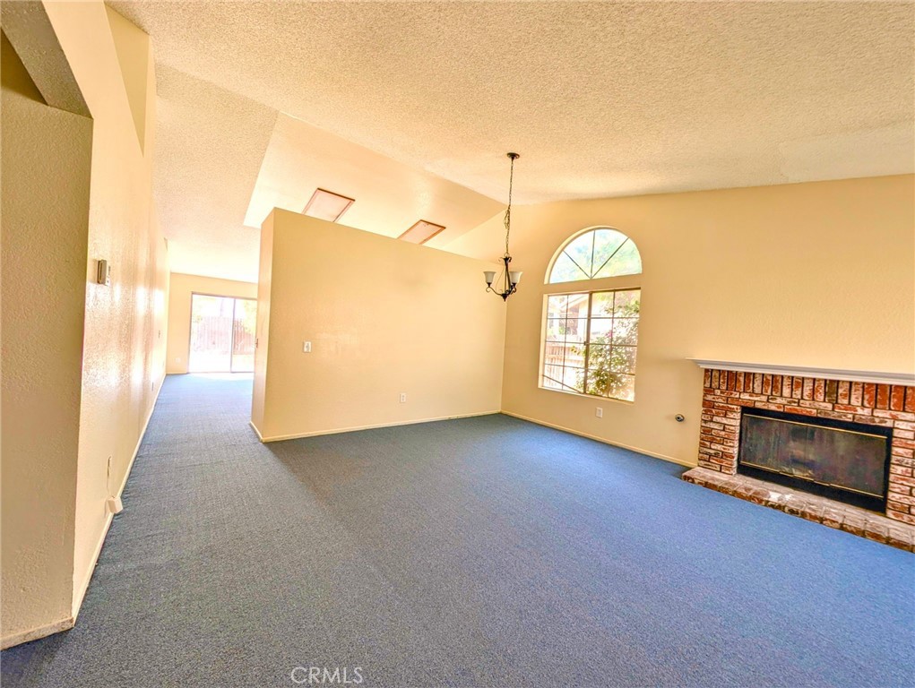 2795 Rosarita Street San Bernardino, CA 92407 - Photo 6 of 35 a view of empty room with floor to ceiling window