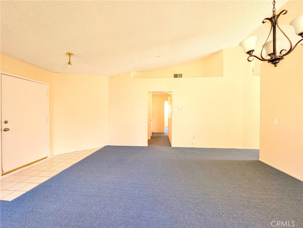 2795 Rosarita Street San Bernardino, CA 92407 - Photo 7 of 35 a view of a room with gym equipment