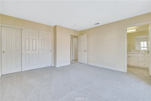 a bathroom with a sink a mirror and a toilet