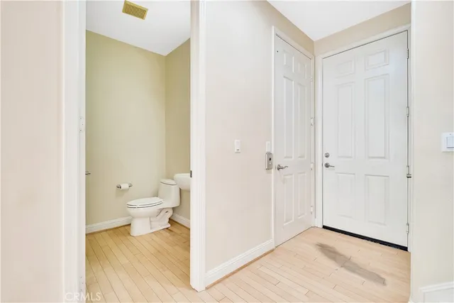 a view of a room that has a large window