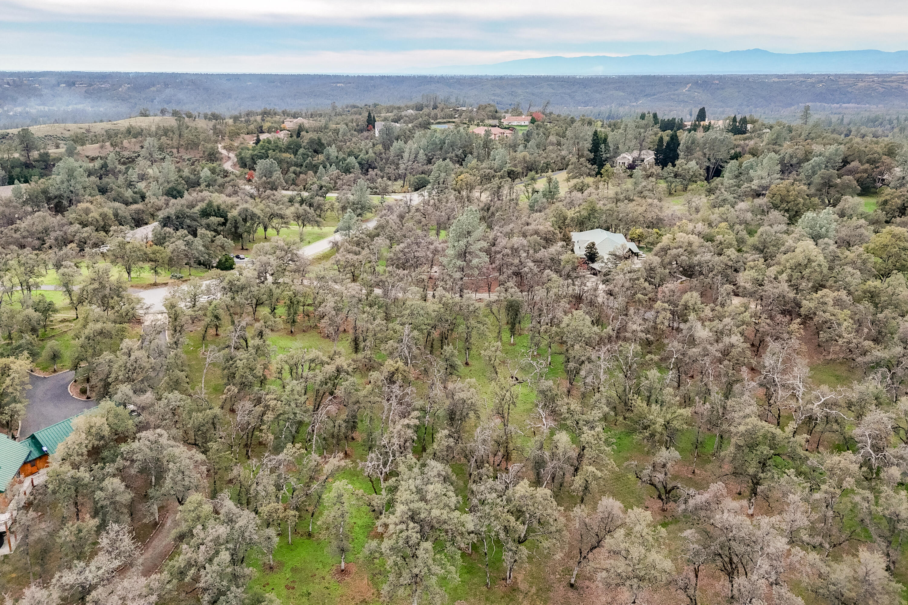 El Camino Robles Road Redding, CA 96001 - Photo 10 of 12 an aerial view of residential houses with outdoor space