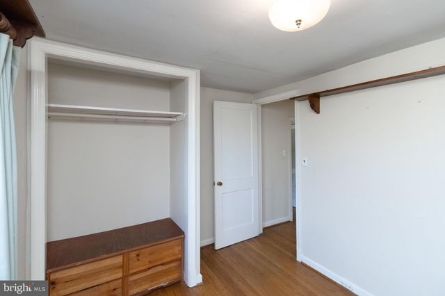 a view of room with wooden floor