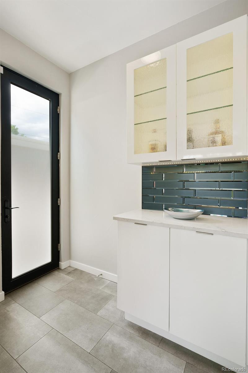 2145 King Street Denver, CO 80211 - Photo 13 of 40 a view of kitchen with wooden floor and cabinets