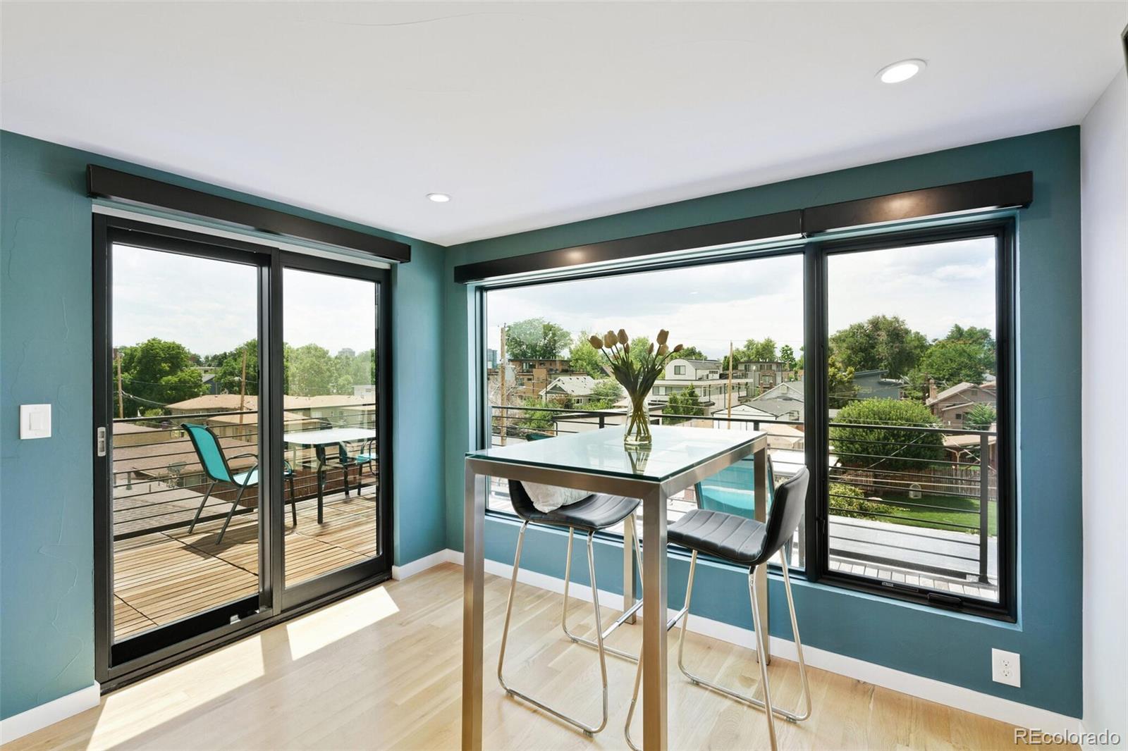 2145 King Street Denver, CO 80211 - Photo 24 of 40 a view of a large room with wooden floor and outdoor view