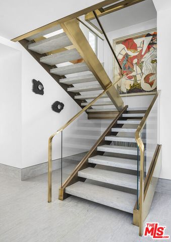 a view of a hallway view with living area