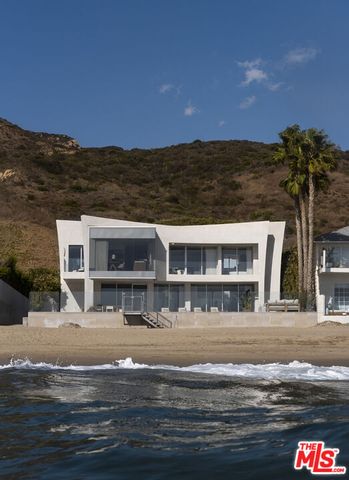 a view of car parked in front of house