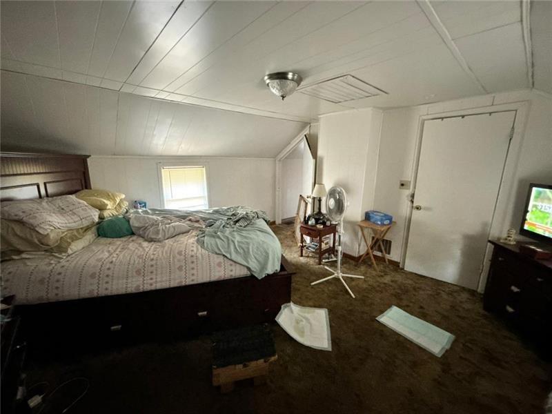 170 Portman Street McKees Rocks, PA 15136 - Photo 12 of 24 a living room with furniture and a flat screen tv