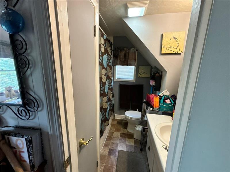 170 Portman Street McKees Rocks, PA 15136 - Photo 15 of 24 a view of living room with furniture and a fireplace