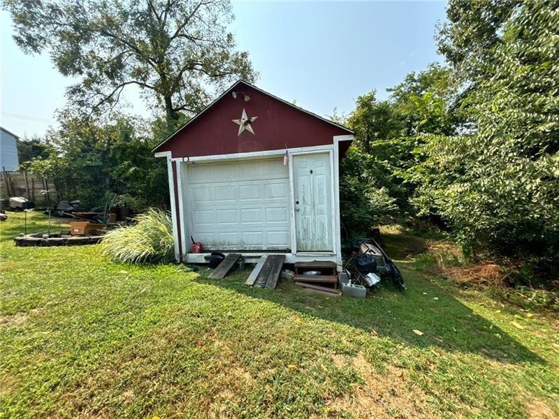 170 Portman Street McKees Rocks, PA 15136 - Photo 18 of 24 a view of backyard of house with green space