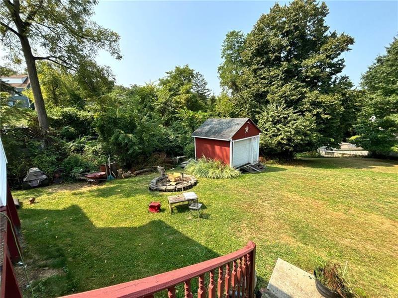 170 Portman Street McKees Rocks, PA 15136 - Photo 20 of 24 a view of a house with swimming pool and a yard