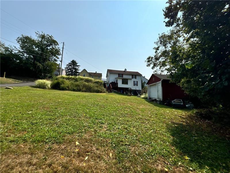 170 Portman Street McKees Rocks, PA 15136 - Photo 21 of 24 a backyard of a house with lots of green space