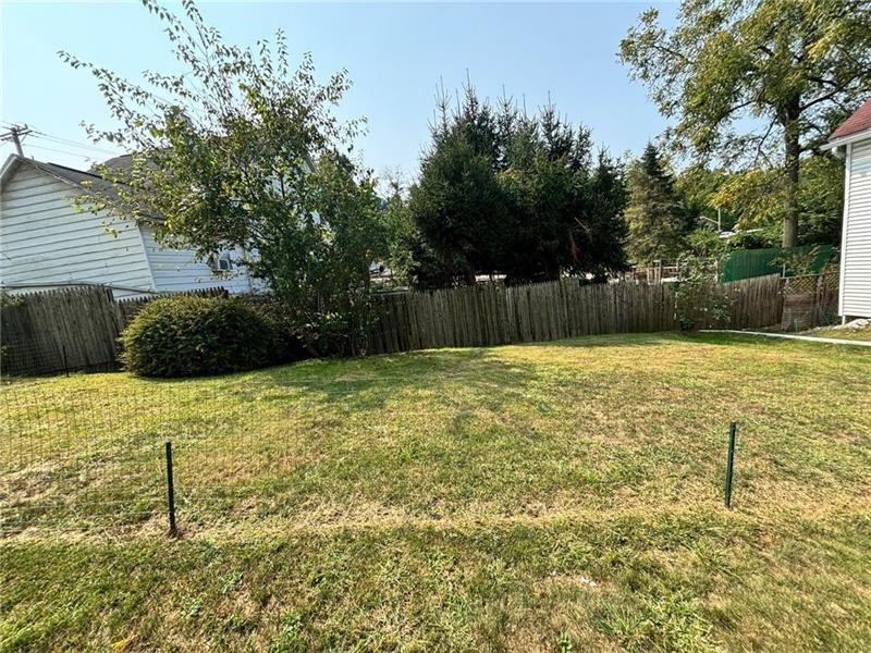 170 Portman Street McKees Rocks, PA 15136 - Photo 22 of 24 a swimming pool with some trees in the background