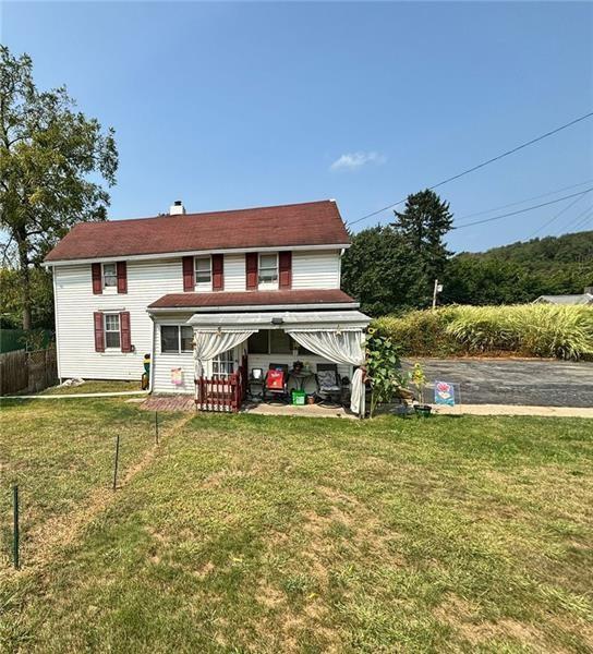 170 Portman Street McKees Rocks, PA 15136 - Photo 24 of 24 a view of a house with a big yard and large trees