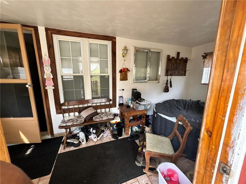 170 Portman Street McKees Rocks, PA 15136 - Photo 4 of 24 a room with furniture and a window