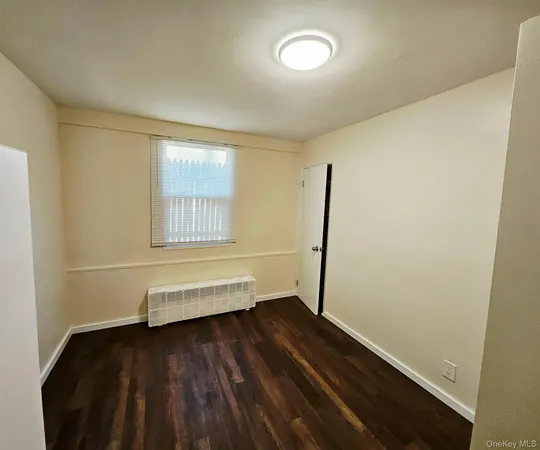 a view of small space with wooden floor