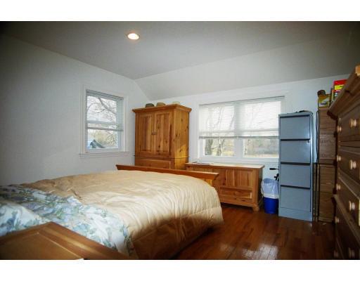 18 Brookside Road Needham, MA 02492 - Photo 2 of 10 a bedroom with a bed and a window