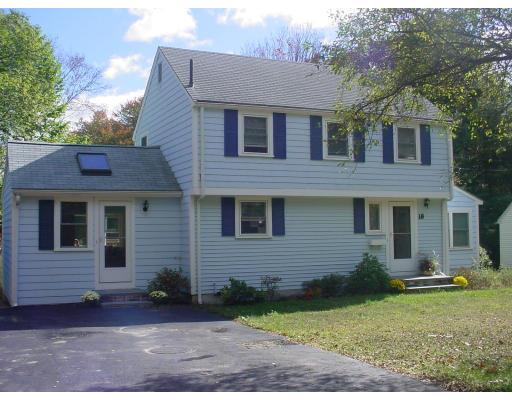 18 Brookside Road Needham, MA 02492 - Photo 5 of 10 a front view of a house with garden