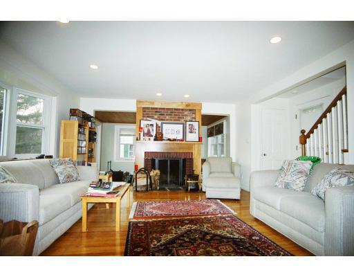 18 Brookside Road Needham, MA 02492 - Photo 8 of 10 a living room with furniture and a fireplace