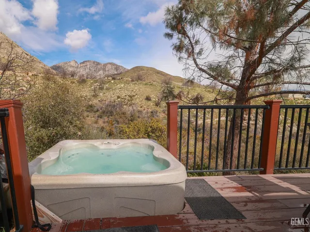 a view of an entryway with a table and a window