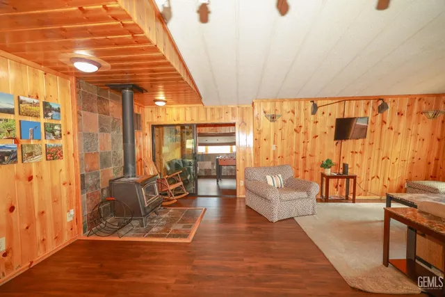 a bedroom with a bed and a mirror