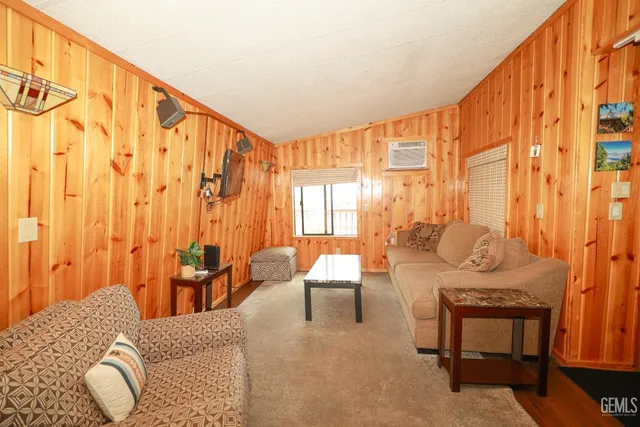 a bathroom with a sink a mirror and a shower