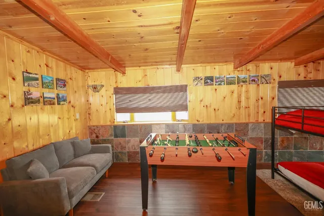 a view of a yard with large trees