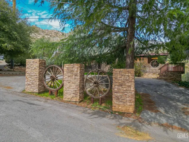 a aerial view of a house with a yard