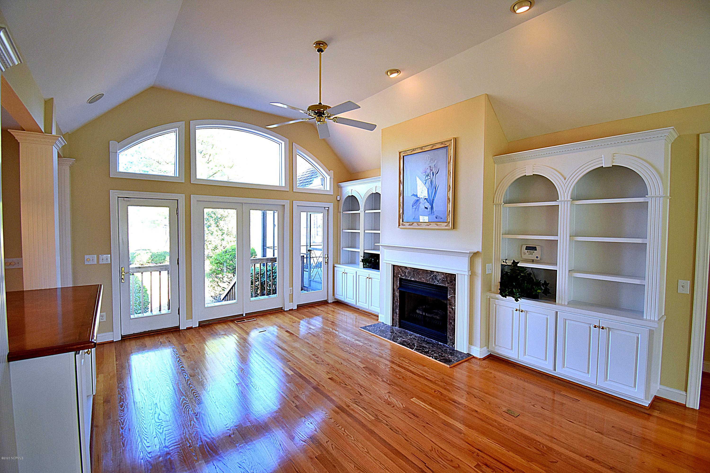 222 Mellen Road New Bern, NC 28562 - Photo 6 of 30 Wall of Windows and Doors leading to deck