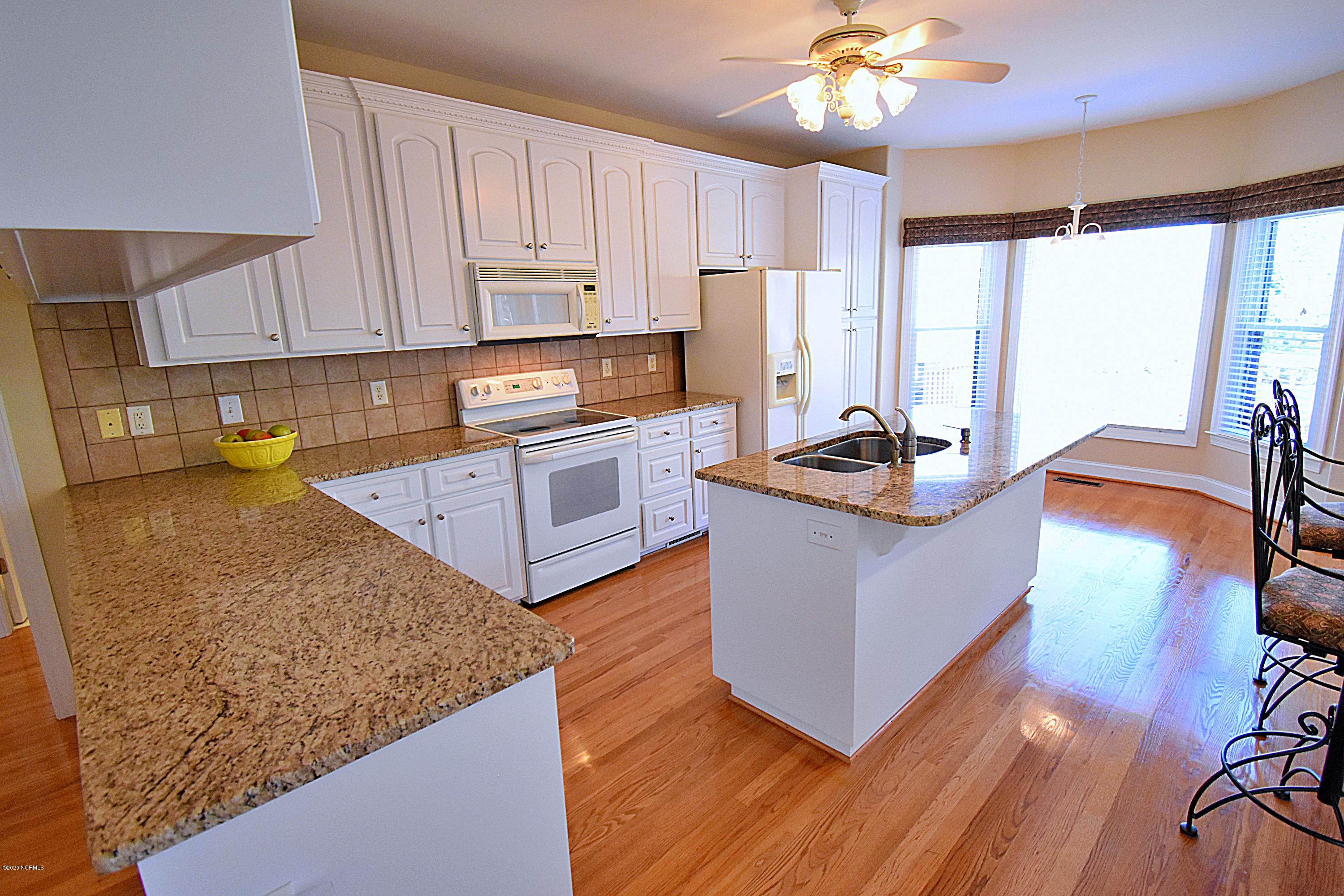 222 Mellen Road New Bern, NC 28562 - Photo 7 of 30 Beautiful hardwood floors in Living Room and Kitchen
