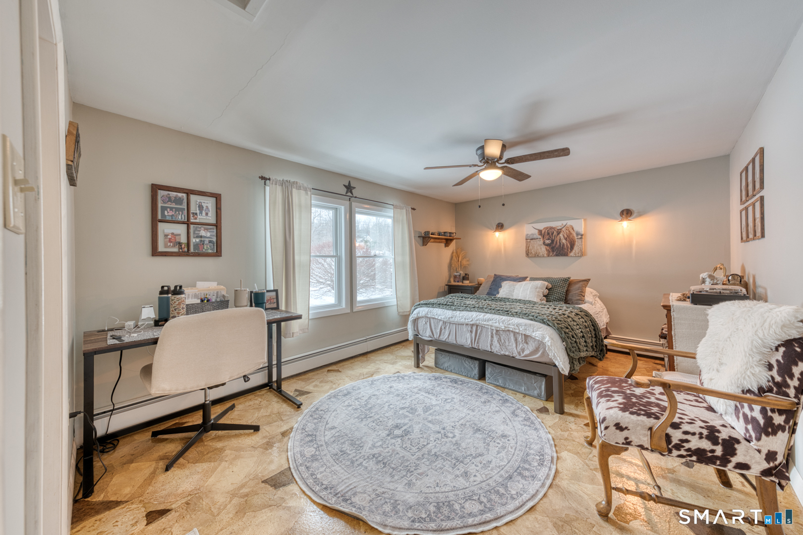 144 Hnath Road Ashford, CT 06278 - Photo 18 of 40 a bedroom with a bed and wooden floor