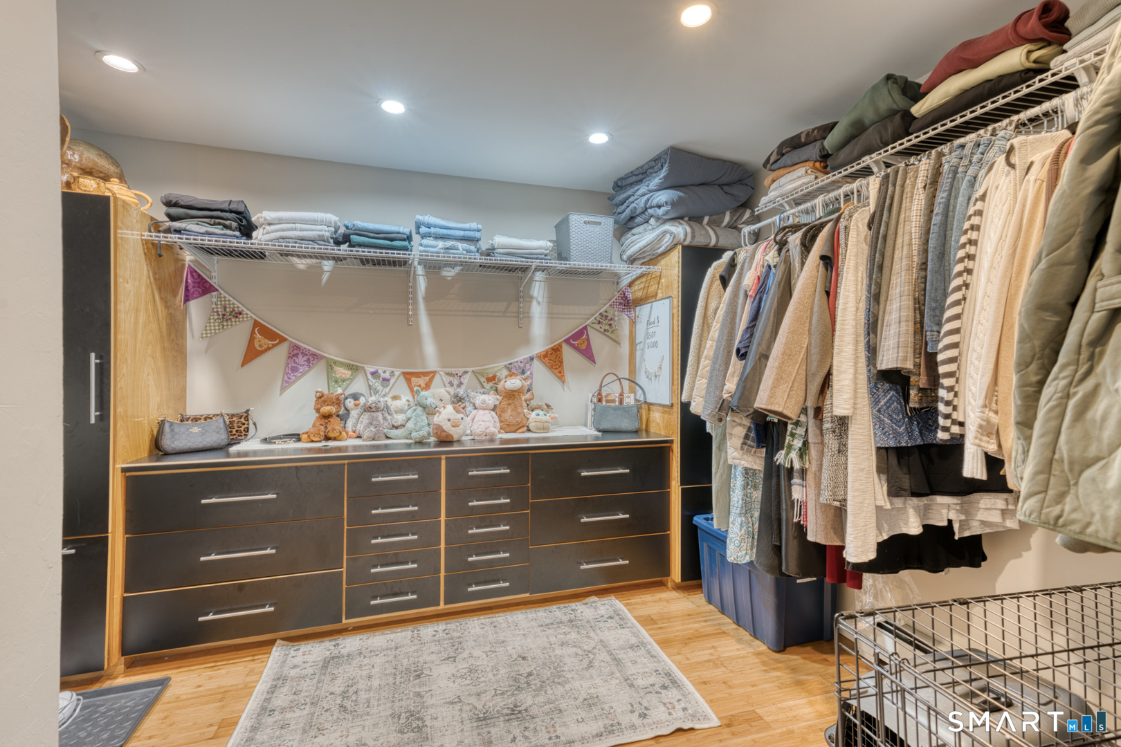 144 Hnath Road Ashford, CT 06278 - Photo 20 of 40 a view of walk in closet with clothes and shoes