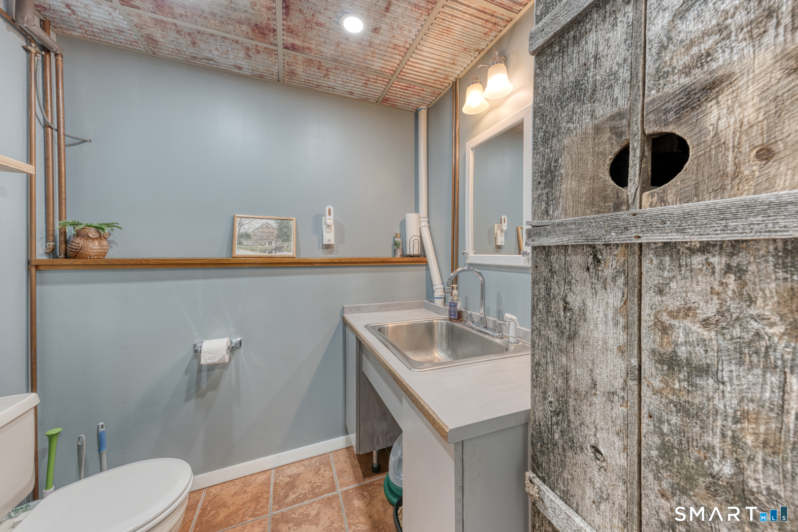 144 Hnath Road Ashford, CT 06278 - Photo 25 of 40 a bathroom with a sink a toilet and shower