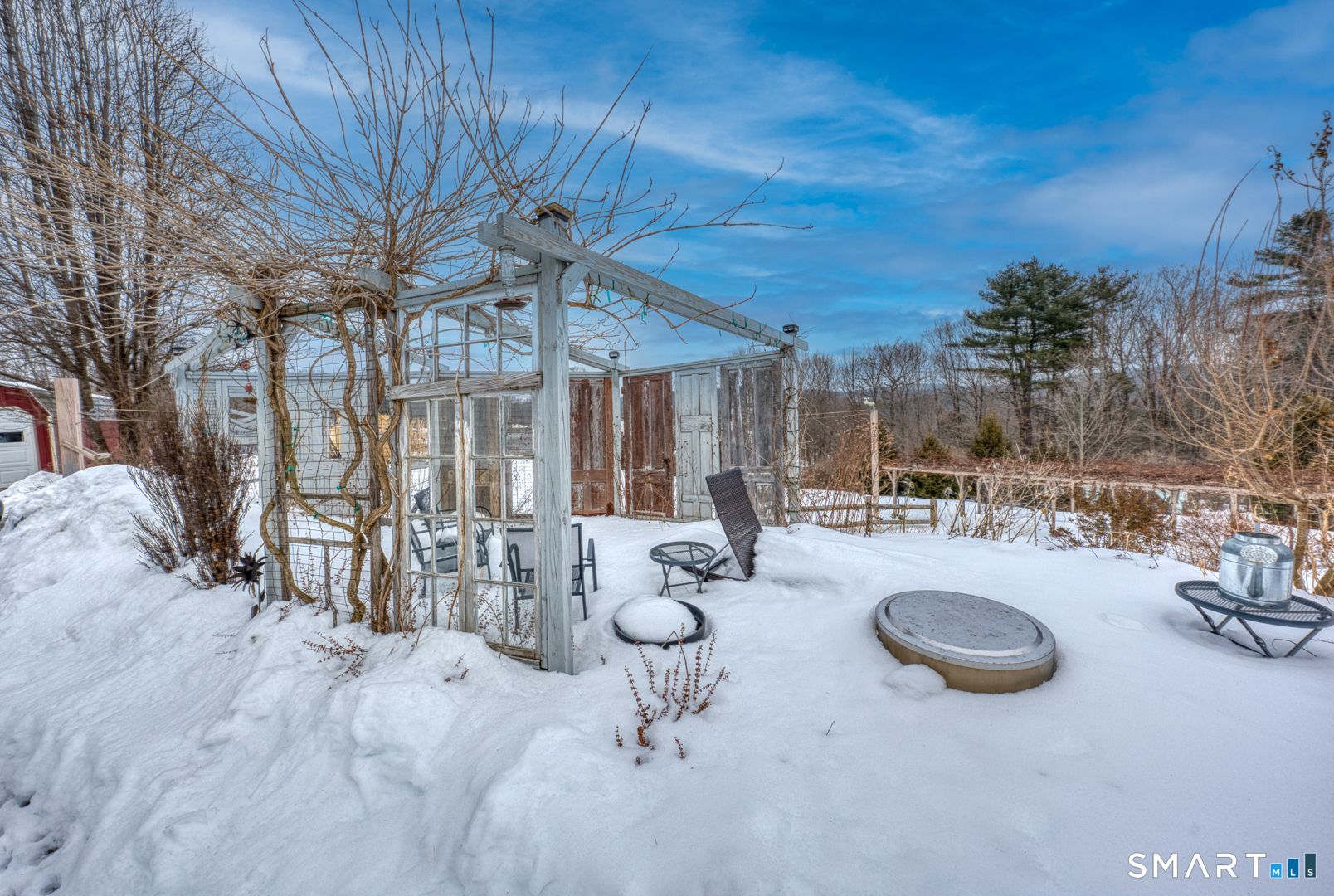 144 Hnath Road Ashford, CT 06278 - Photo 28 of 40 a view of a swimming pool with chairs and tables