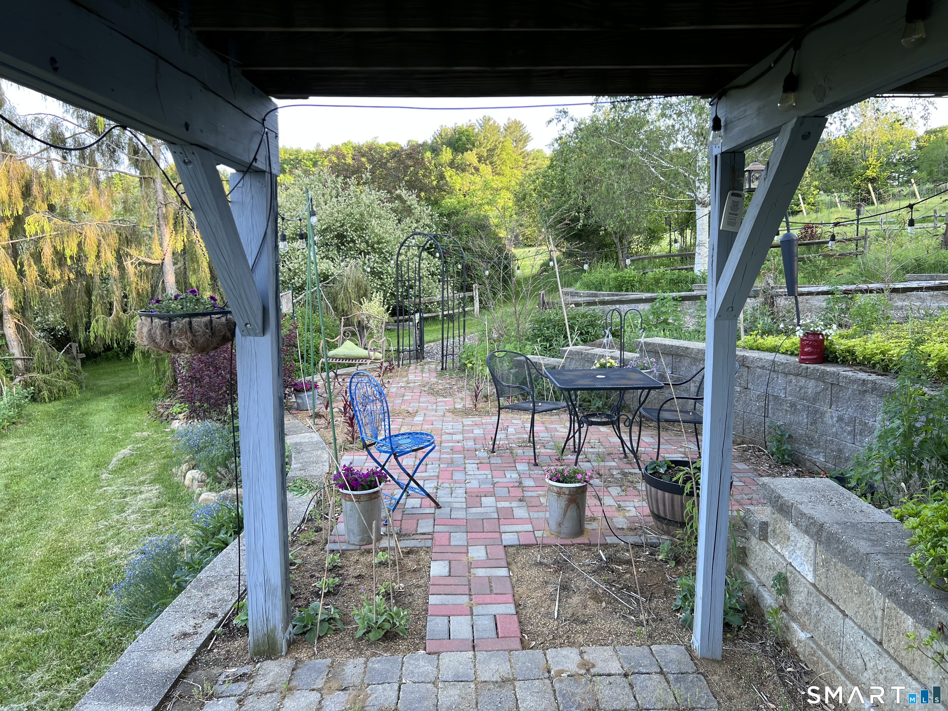 144 Hnath Road Ashford, CT 06278 - Photo 40 of 40 a view of a porch with chairs and backyard