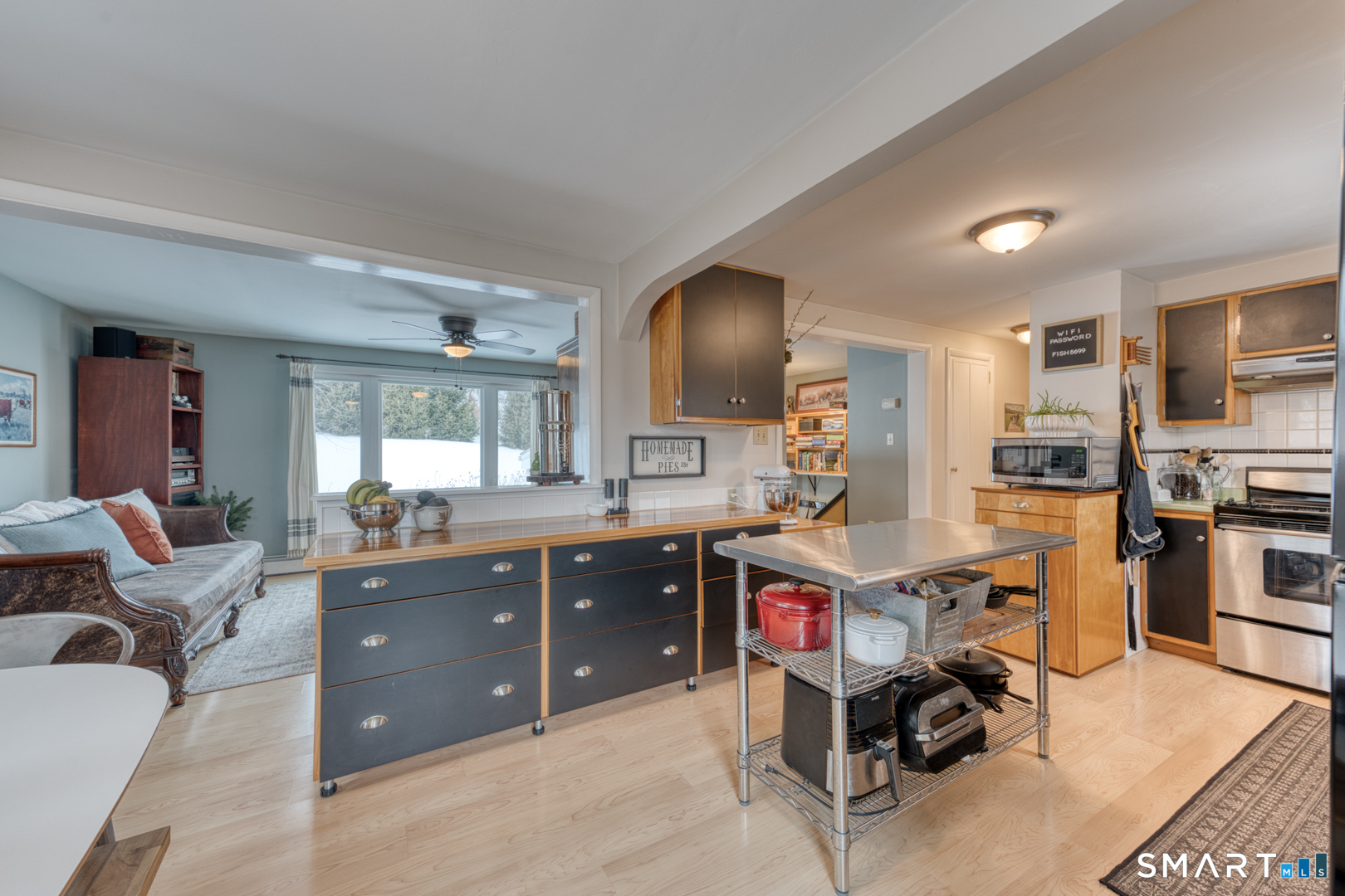 144 Hnath Road Ashford, CT 06278 - Photo 10 of 40 a kitchen with stainless steel appliances granite countertop a sink stove and refrigerator