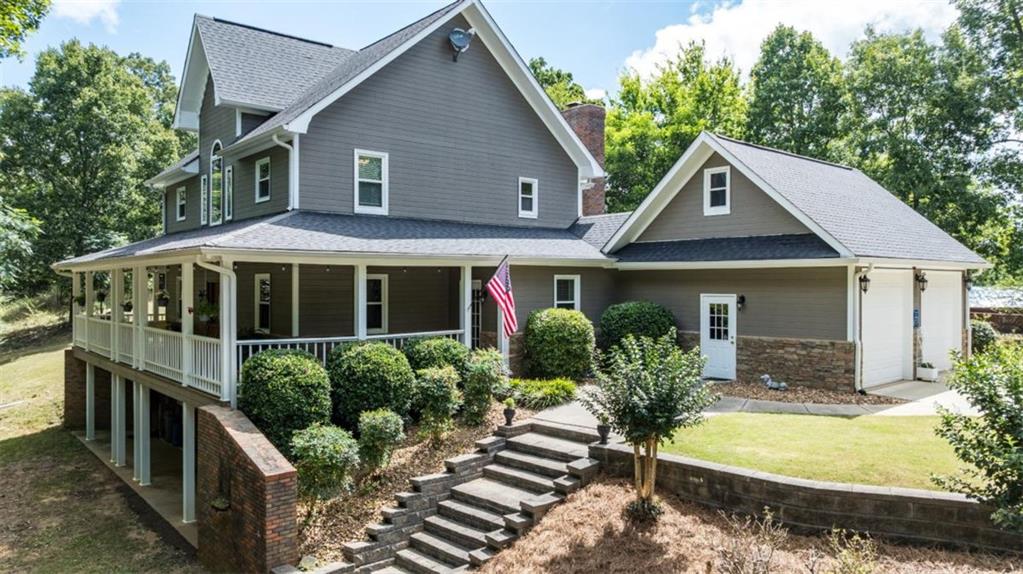 612 Eden Valley Road Southeast Rome, GA 30161 - Photo 1 of 1 a front view of a house with a yard