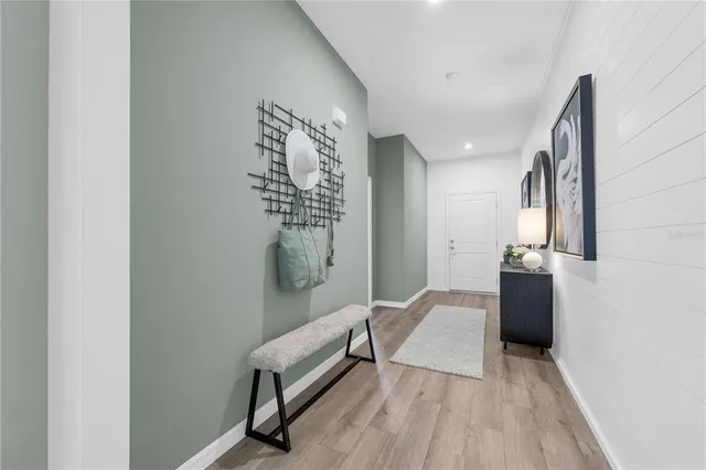 a view of a hallway with entryway