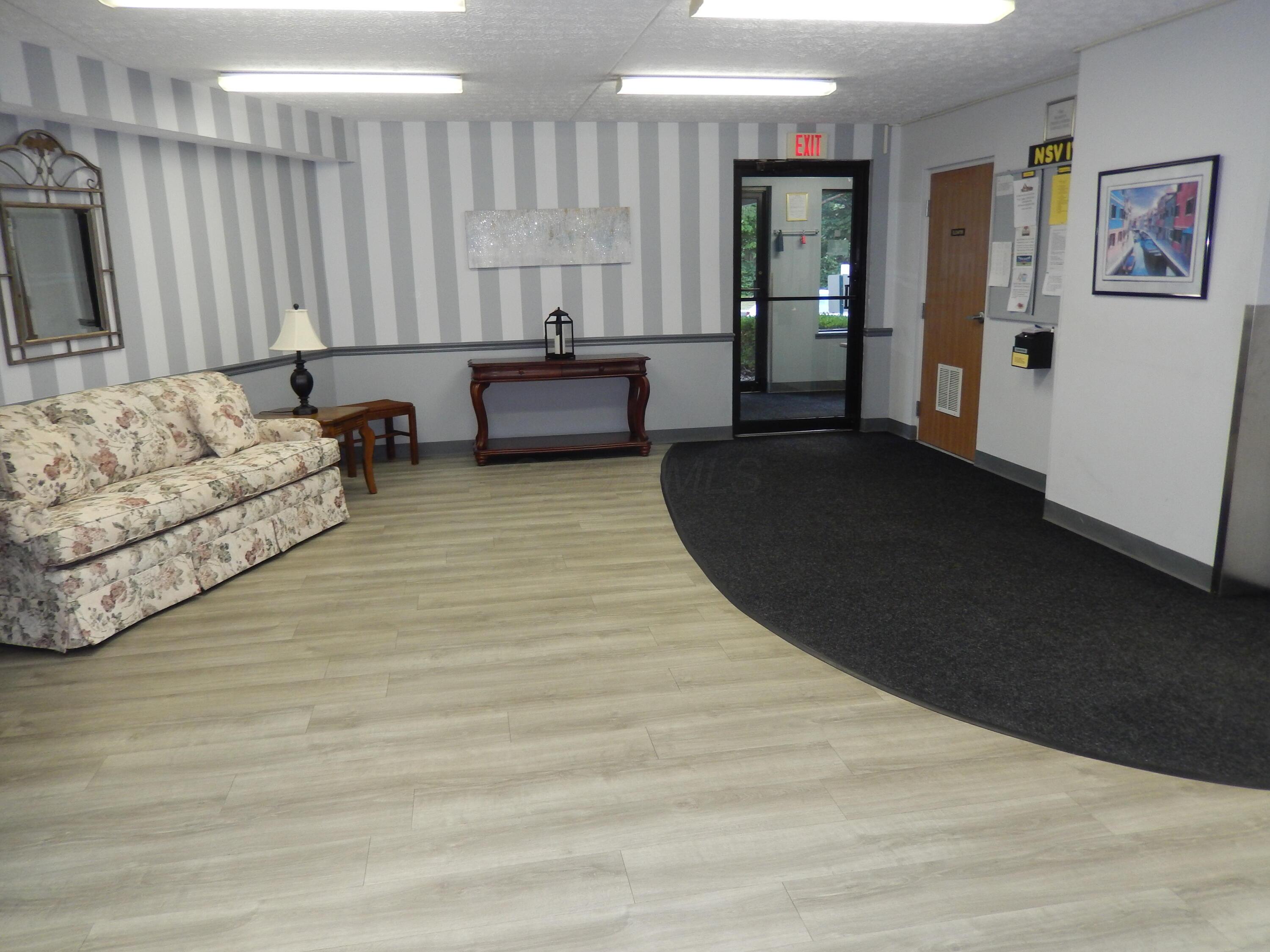 3939 Karl Road, Unit 122 Columbus, OH 43224 - Photo 5 of 57 Entrance from outside to the lobby and gathering area.