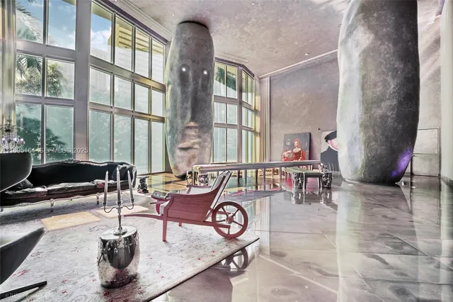 a view of a street with a building and trees in the background