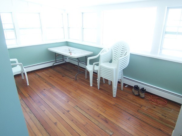 12 Atlas Road Braintree, MA 02184 - Photo 14 of 17 a view of a room with wooden floor and furniture