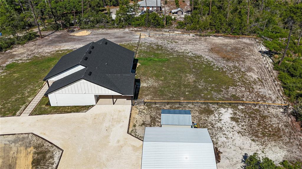 7890 Southwest 129th Avenue Cedar Key, FL 32625 - Photo 7 of 45 an aerial view of residential houses with outdoor space