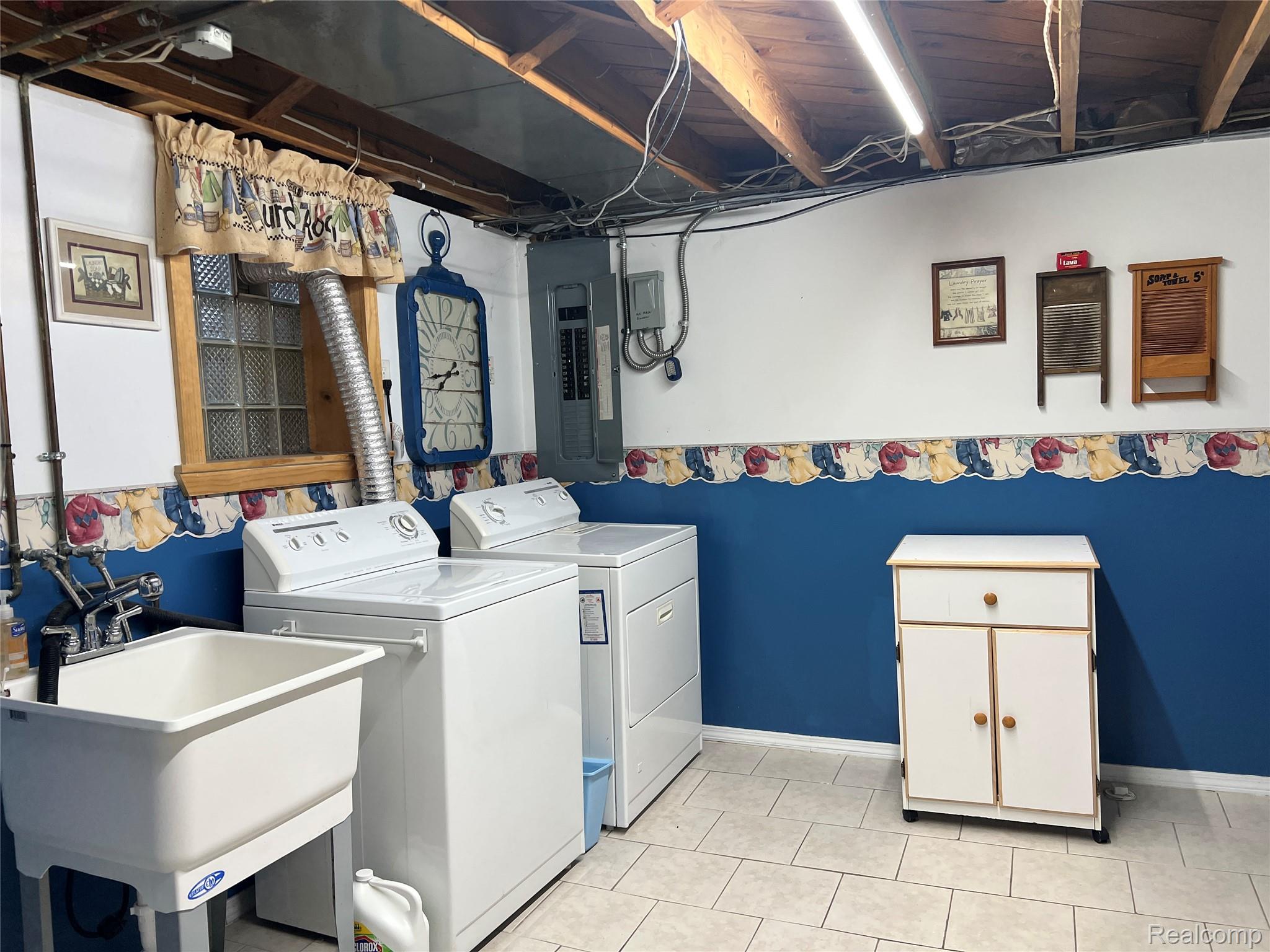 36795 Greenbush Road Wayne, MI 48184 - Photo 59 of 61 Laundry area featuring electric panel, separate washer and dryer, and light tile patterned floors