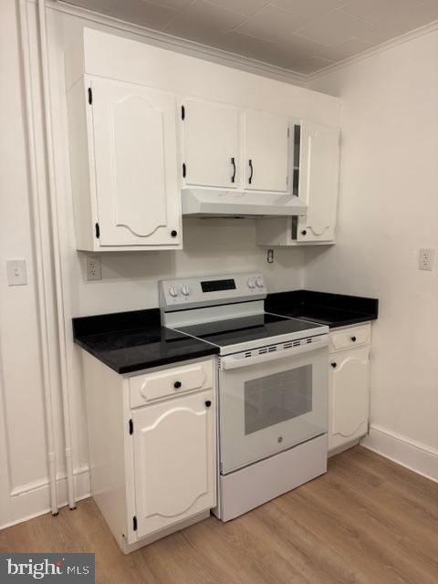 1424 Huddell Avenue Marcus Hook, PA 19061 - Photo 5 of 20 a kitchen with granite countertop white cabinets and white appliances