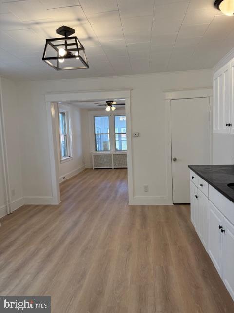 1424 Huddell Avenue Marcus Hook, PA 19061 - Photo 7 of 20 wooden floor in an empty room with a window