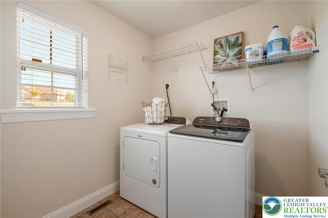 208 East Dell Road Bath, PA 18014 - Photo 20 of 40 a view of storage and utility room with washer and dryer