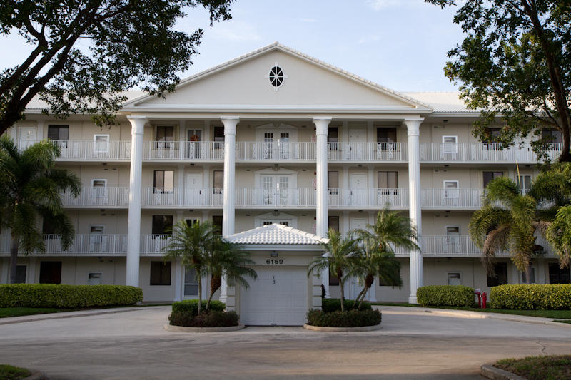 6169 Balboa Circle, Unit 203 Boca Raton, FL 33433 - Photo 1 of 19 a front view of residential houses with street