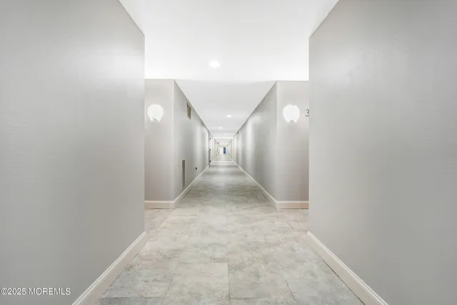 a view of a hallway with entryway