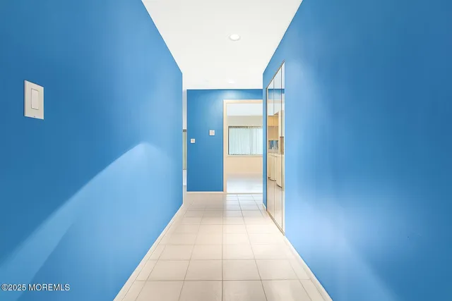 a view of hallway with a large window