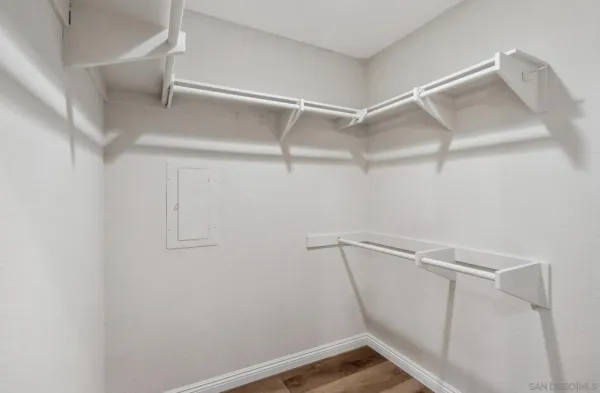a view of an empty walk in closet