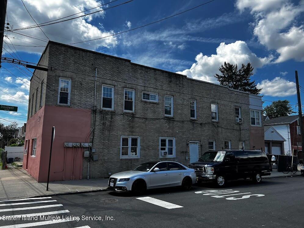 1641 Castleton Avenue Staten Island, NY 10302 - Photo 2 of 15 a car parked in front of a building